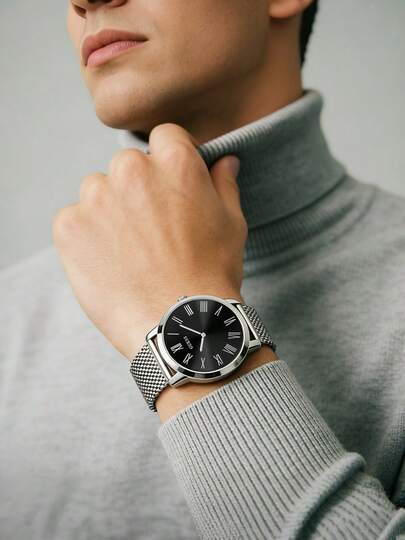 Guess Reloj minimalista para hombre, elegante y clásico, con correa de malla milanesa plateada, esfera negra, marcadores de hora con números romanos, diseño ligero y delgado, estilo elegante e informal para negocios, versátil para uso diario, para ir al trabajo o para salidas.