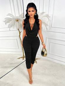 Bộ jumpsuit dệt kim thanh lịch Amarilo dành cho nữ, thiết kế lưới tương phản và chi tiết xẻ tà phía sau, dáng ôm tôn dáng. - màu đen - Xem 1