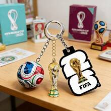 FIFA مجموعة هدايا مفاتيح لحفلاته/حفلاتها - مجموعة 3 قطع كأس العالم 2026 الولايات المتحدة/المكسيك/كندا، تشمل مفتاح كأس العالم الصغير، قلادة إكسسوار كرة القدم كأس العالم، مفتاح سحر حقيبة الظهر، ديكور حصري لمشاهدة المشجعين - متعدد الألوان - مشاهدة 7