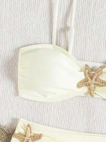 Bikini elegante chic de verano para mujer  2026 conjunto dos piezas color morado sólido con detalles de estrella de mar dorada top bandeau y parte inferior de talle alto que disimula la panza look ideal para playa vacaciones fiestas en la playa y fotos de verano - lechoso - Ver 2