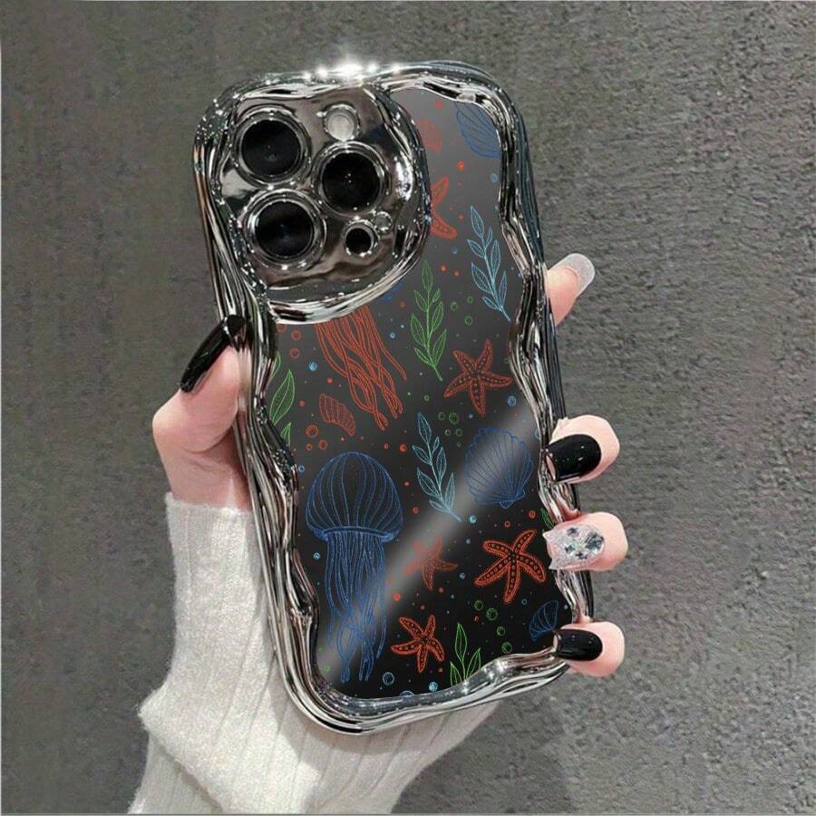 1 unidad Patrón submarino medusas estrellas conchas algas Funda para iPhone 16 e, fabricada en TPU suave y flexible, con gran resistencia a la deformación y protección contra el amarilleo. Cuenta con un exclusivo borde ondulado y acabado electrobrillante de estilo elegante. Brinda protección integral para el móvil y la cámara, resistente a impactos, arañazos y decoloración a largo plazo. Perfecta para el uso cotidiano, trabajo y viajes. - Plateado - Ver 1