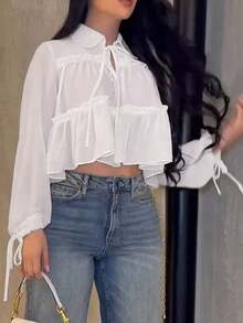 Camisa elegante y casual para mujer, diseño asimétrico, manga farol con lazo en el cuello, tela tejida de unicolor con bajo plisado, elegante para uso diario, citas, vacaciones, primavera/verano en color blanco - Blanco - Ver 3