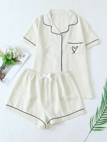 2pcs Plus Size Women Summer Solid Color Collar Contrast Trim Pocket Heart Embroidery Short Sleeve Button Top And Bow Shorts Pajama Set, Suitable For Home Wear