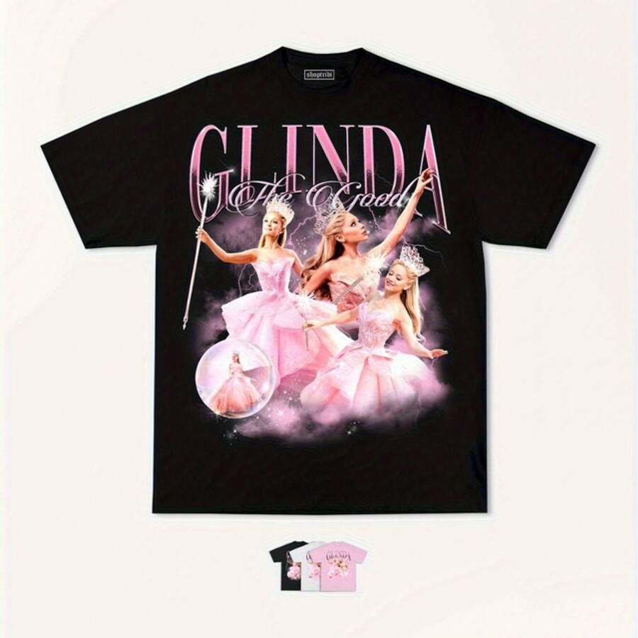Camiseta gráfica de  del cine Wicked - Negra con detalles rosados - Camiseta de manga corta unisex para teatro, gimnasio, Halloween - Tallas S-5XL - Ropa oficial para fanáticos del musical Wicked, ropa de gimnasio, ropa casual, estilo deportivo, ajuste cómodo, tejido duradero, ropa casual, traje de vacaciones, cuello redondo, impresión de alta calidad, camiseta impresa, amantes del teatro - Negro - Ver 1