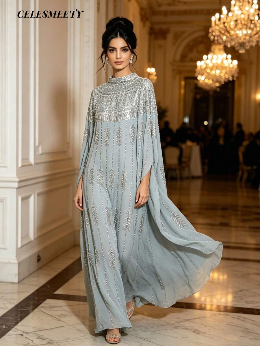 Áo choàng dài kiểu Ả Rập thanh lịch bằng vải chiffon, được trang trí bằng các chi tiết đính cườm vàng, thiết kế tay áo cánh dơi, cổ đứng, vải dệt màu đen, không co giãn, thích hợp cho mùa xuân.