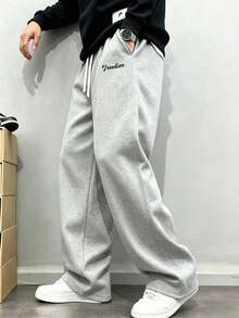 Men's Casual Sweatpants, Loose Straight-Leg Fit, Comfortable Drape, Suitable For Lounging And Outdoor Activities. Also Makes A Great Couples Gift. Made Of 100% Polyester Fabric With Drawstring Waistband For Adjustable Fit, Available In Multiple Colors. - Light Grey - View 5