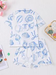 Bộ đồ ngủ trẻ em mùa hè kiểu dáng đại dương, chống cháy, gồm 2 món: áo khoác cardigan tay ngắn cổ bẻ và quần short cạp chun rộng rãi, nền trắng phối họa tiết đại dương xanh và vỏ sò, bộ đồ ngủ mặc nhà thoải mái, rộng rãi cho trẻ lớn. - trắng - Xem 2