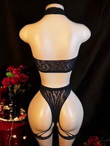 2 piezas Conjunto de lencería de encaje para mujer con portaligas - Sujetador y tanga de malla transparente con estampado de leopardo, ropa de dormir sexy - Negro - Ver 2