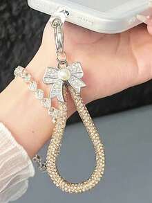 1 Piece Short Bow-Shaped Rhinestone Mobile Phone Hanger. The Design Features Sparkling Rhinestones And A Delicate Pearl Bow. It Exudes A Sense Of Sophistication. Multiple Colors Are Available. The Sturdy Metal Clasp Can Be Attached To Bags, Keys, Mobile Phones, Cameras, Headphones, And Cases. It Prevents Loss And Is Very Attractive. It Is An Extremely Practical Accessory For Mobile Phone Decorations Or Accessories. - Multicolor - View 7