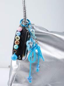 1 pieza Llavero multicolor de cuerda trenzada dulce, con cuentas de letras, decoración de dije iridiscente y campana, broche colorido, lindo accesorio para bolso de mujer - Multicolor - Ver 10