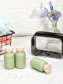 Set de 3 botellas de viaje rellenables que incluye contenedores para champú, gel de baño y loción - Multicolor - Ver 3