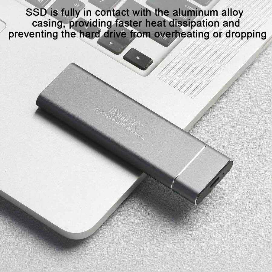 Balance Fit M.2 NVMe SSD 硬盘盒，支持 10Gbps USB 3.2 Gen2 接口，铝合金材质，兼容 2230/2242/2260/2280 NVMe SSD，附带 USB-C 数据线和适配器。 - 灰色 - 查看 1