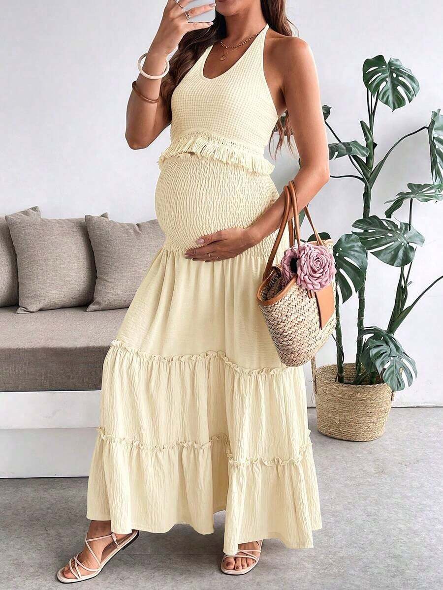 Conjunto de verano de estilo vacacional, una parte superior de halter de color amarillo pálido con flecos combinada con una falda evasé de línea A para mujeres embarazadas.El cinturón de cintura extra ancho y recogido es cómodo y no oprime el vientre.Conjunto de dos piezas.Top de halter de unicolor y falda evasé con volante de dos piezas para maternidad, vestido de maternidad de color beige para vacaciones, vestido de maternidad, atuendos de maternidad para el verano, vestido de maternidad, conjunto de maternidad para el verano, vestido de maternidad para el verano, atuendos de maternidad para el verano, vestido de maternidad para baby shower, atuendos para mujeres embarazadas, ropa de maternidad, vestidos de maternidad para sesión de fotos, vestido de smocking, vestido amarillo para mujer, vestidos envolventes para la playa para damas, vestido Zanzea para mujer, vestido wow para mujer, vestidos de verano para mujer, atuendos de verano para mujer, conjuntos de verano para mujer, ves - Albaricoque 2 - Ver 1