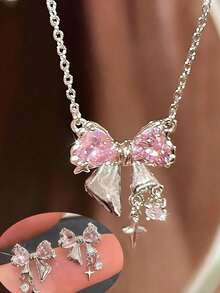 Bộ trang sức 3 món đính đá Zirconia hồng lấp lánh hình nơ tình yêu, mặt dây chuyền và bông tai, thiết kế thanh lịch tối giản, thích hợp cho ngày Valentine. - Đồ trang sức - Xem 1