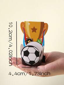 Football Trophy Shaped Party Paper Box, Designed With Trophy And Football Elements, Dynamic And Eye-Catching With A Ceremonial Feel. Made Of Thick Cardboard, Easy To Assemble, Can Store Candies, Snacks Or Event Souvenirs, Suitable For Football Themed Parties, Viewing Gatherings, Fan Activities, Adding Energetic Sports Atmosphere To Event Decor, A Practical And Creative Themed Packaging Item. - View 4