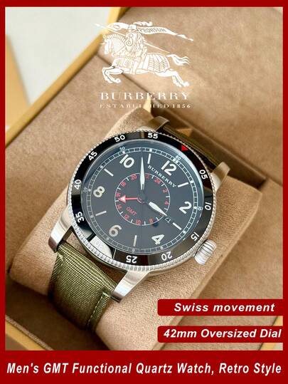 Burberry Đồng hồ đeo tay nam Thụy Sĩ GMT, vỏ bạc, dây đeo nylon màu xanh ô liu, mặt số đen, máy quartz.