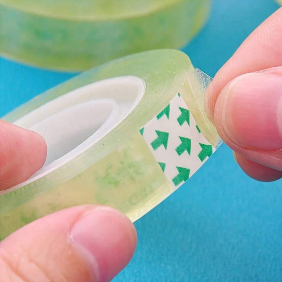 12 cuộn băng dính văn phòng phẩm mini trong suốt, độ bám dính cao, dễ xé không bị đứt, thích hợp cho trường học, văn phòng, sửa chữa giấy tờ và sử dụng hàng ngày.