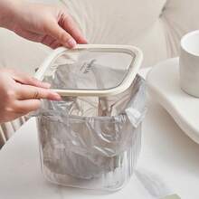 Thùng rác mini để bàn có nút bấm, trong suốt và kiểu dáng trang nhã, thích hợp sử dụng trong nhà, phòng ngủ hoặc cạnh giường ngủ. - Xem 10
