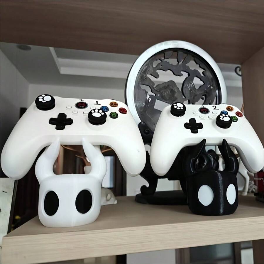 1个通用游戏手柄支架，兼容所有游戏手柄。创意桌面展示架，炫酷游戏配件，是游戏玩家桌面收纳和装饰的理想之选。 - A - 查看 1