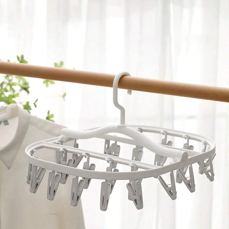 1 cái - Giá phơi đồ gấp gọn với 32 kẹp, móc treo xoay 360° dùng để phơi tất, đồ lót, quần áo, khăn tắm, găng tay. - Nhiều màu - Xem 1