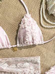 Swim Mod Conjunto de 3 piezas, traje de baño sexy para mujer con sujetador triangular halter con textura floral y decoración dorada, braguitas de bikini con lazos laterales y falda pareo.Conjunto de bikini de 3 piezas con top de encaje, pareo de encaje y cobertura de playa.Conjunto de bikini con top de cuentas, concha y cobertura para vacaciones y festivales. - Rosa Pálido - Ver 2