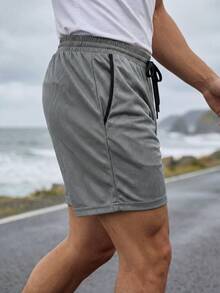 KEFITEVD Men's Sports & Fitness Shorts, High-Quality Mesh Fabric, 4-Way Stretch, Lightweight & Breathable, Super Soft, Deep Side Pockets, Adjustable Drawstring, Suitable For Gym Workouts & Fitness Activities - Grey - View 4