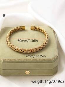 Un brazalete de acero inoxidable para hombres de estilo minimalista, tejido y anudado de forma irregular y abierta - Dorado - Ver 14
