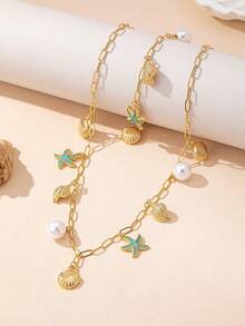 Set de 2 piezas de pulsera y collar con perlas y diseños de estrella de mar y concha, elegante y versátil para uso diario de mujeres - Celeste - Ver 2