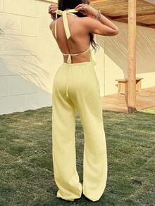 Conjunto de dos piezas con top halter de cuello en V profundo y textura arrugada en color albaricoque, y pantalones rectos de cintura baja.Conjunto de mujer para primavera/verano, vacaciones, playa, estilo bohemio minimalista, elegante y vintage, de uso versátil. - Amarillo - Ver 2