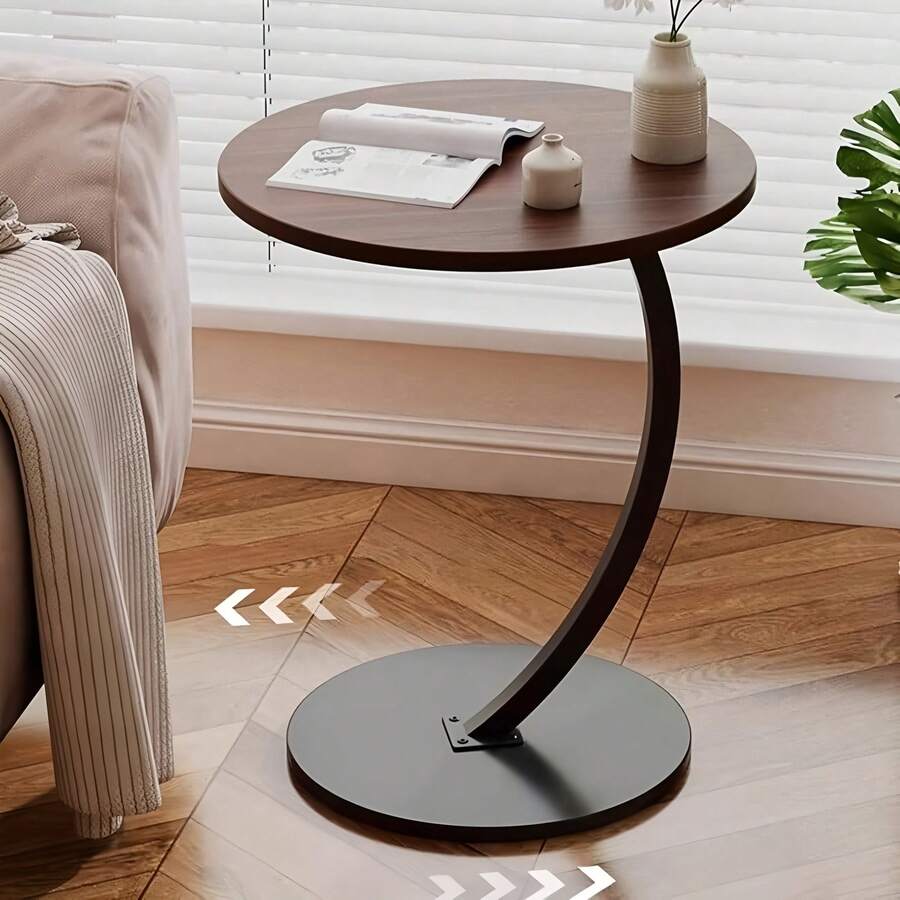 Bàn phụ sáng tạo và tối giản, bàn phụ hình chữ C hiện đại tối giản, bàn cà phê nhỏ cho phòng khách, bàn trà nhẹ, bàn sân vườn, bàn tròn kiểu retro đặt cạnh ghế sofa. Có hai kiểu dáng, khung kim loại kết hợp với mặt bàn bằng gỗ. Hoàn hảo để sử dụng làm bàn phụ bên cạnh ghế sofa, có thể để nhiều vật dụng như tách cà phê, sách và máy khuếch tán tinh dầu. Dễ lau chùi, dễ di chuyển, chắc chắn và bền. Thích hợp cho phòng khách, nhà bếp, phòng ngủ, không gian nhà ở hiện đại và căn hộ nhỏ, có thể sử dụng cả trong nhà và ngoài trời. Đồng thời, đây cũng là một món quà tuyệt vời cho dịp lễ cũng như một vật trang trí tinh tế để tô điểm cho phòng khách của bạn. - Lạc đà - Xem 1