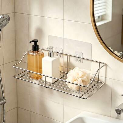 Este suporte de armazenamento possui um design vazado que permite a drenagem e ventilação, evitando o acúmulo de água e a proliferação de bactérias, mantendo o ambiente seco. Ideal para banheiros e cozinhas, não requer furos na parede e não a danifica.