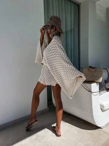 Bộ đồ hai mảnh mùa hè Sylvia dành cho nữ, gồm áo và quần short dệt kim tay loe xuyên thấu, dáng rộng, thoáng khí, mang đến vẻ gợi cảm thoải mái, phù hợp cho công sở, đi biển hoặc kỳ nghỉ đơn giản. - Màu be - Xem 5