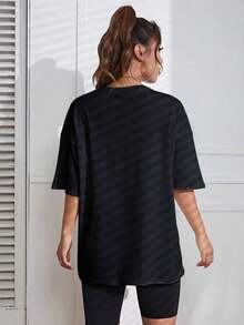 Loose-Fitting Solid-Color T-Shirt With Round Neck And Dropped Shoulders - Black - View 2