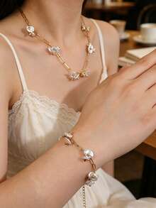 YUZENG Bộ trang sức mạ vàng 18K gồm dây chuyền và vòng tay ngọc trai hình cánh hoa Baroque, kiểu Pháp tinh tế, không gây dị ứng, thích hợp đeo hàng ngày. - Dây chuyền và vòng tay hình cánh hoa - Xem 3