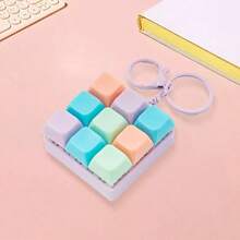 Llavero de teclado mecánico mini, accesorio de escritura portátil, perfecto para viajes y uso de oficina. Este llavero (equipado con teclas de colores y cadena - 9 cuadrículas - Ver 12