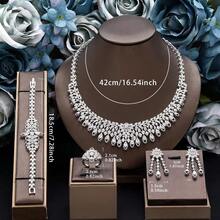 Bộ trang sức 4 món gồm dây chuyền, bông tai, vòng tay và nhẫn màu trắng đính đá Cubic Zirconia, mặt dây chuyền tua rua. Bộ trang sức cao cấp. Thích hợp cho nữ giới, dự tiệc tối, đám cưới, quà tặng ngày Valentine. - trắng - Xem 6