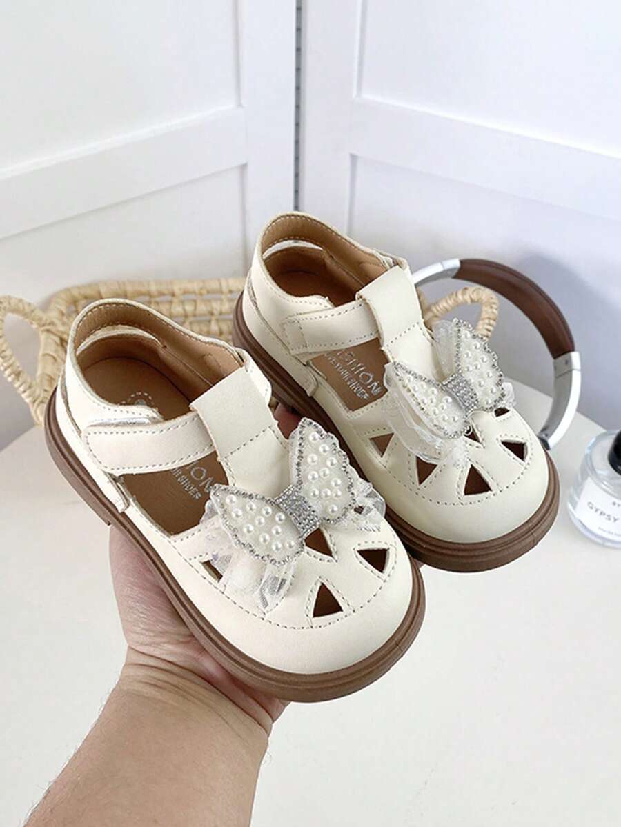 1 Pair Children's Flat Sandals, Girls' Flat Sandals, PU Upper With Bow Decor, Hook And Loop Closure, Lightweight Sole, Suitable For Casual, Outdoor, Party, School, Spring, Summer, Autumn - Beige - View 1