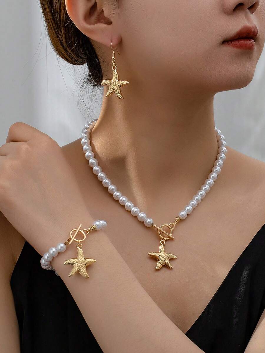 Bộ trang sức 3 món thời trang, thanh lịch, đa năng, tinh tế, đính ngọc trai giả hình sao biển màu vàng, gồm vòng cổ, vòng tay và bông tai, phù hợp cho phụ nữ đeo hàng ngày. - Bộ ba món màu vàng kim - Xem 1