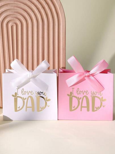 Father's Day Gift Box, Featuring Exquisite "I Love You DAD" Foil-Stamped Text On The Box Cover, Paired With Matching Ribbon Bow. Available In Various Muted Color Tones, Crafted With Thick, Sturdy Cardboard, Durable And Resistant To Deformation. Can Be Used To Package Belts, Razors, Scented Candles, Candies, And Other Father's Day Gifts, Or As A Thoughtful Packaging For Gifts. Adds A Sense Of Ceremony To The Gift, Conveying Love And Gratitude Towards Fathers, Making It An Ideal Accessory For Father's Day Gifting.