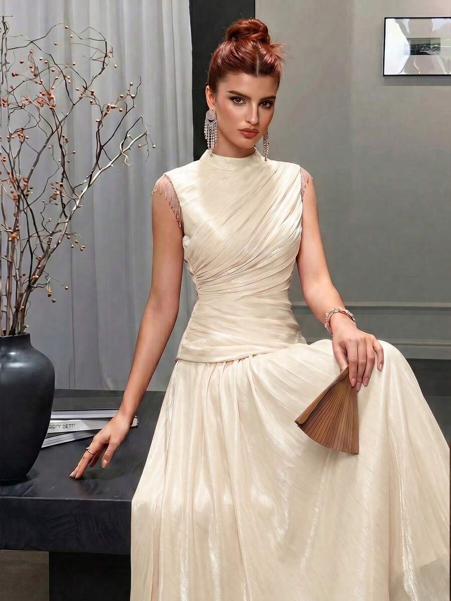 Elegante abito formale di alta gamma senza maniche color albicocca per donna, design con colletto rialzato, gonna svasata, decorato con pieghe e dettagli di perline per matrimonio e festa - Albicocca - Visualizzare 1