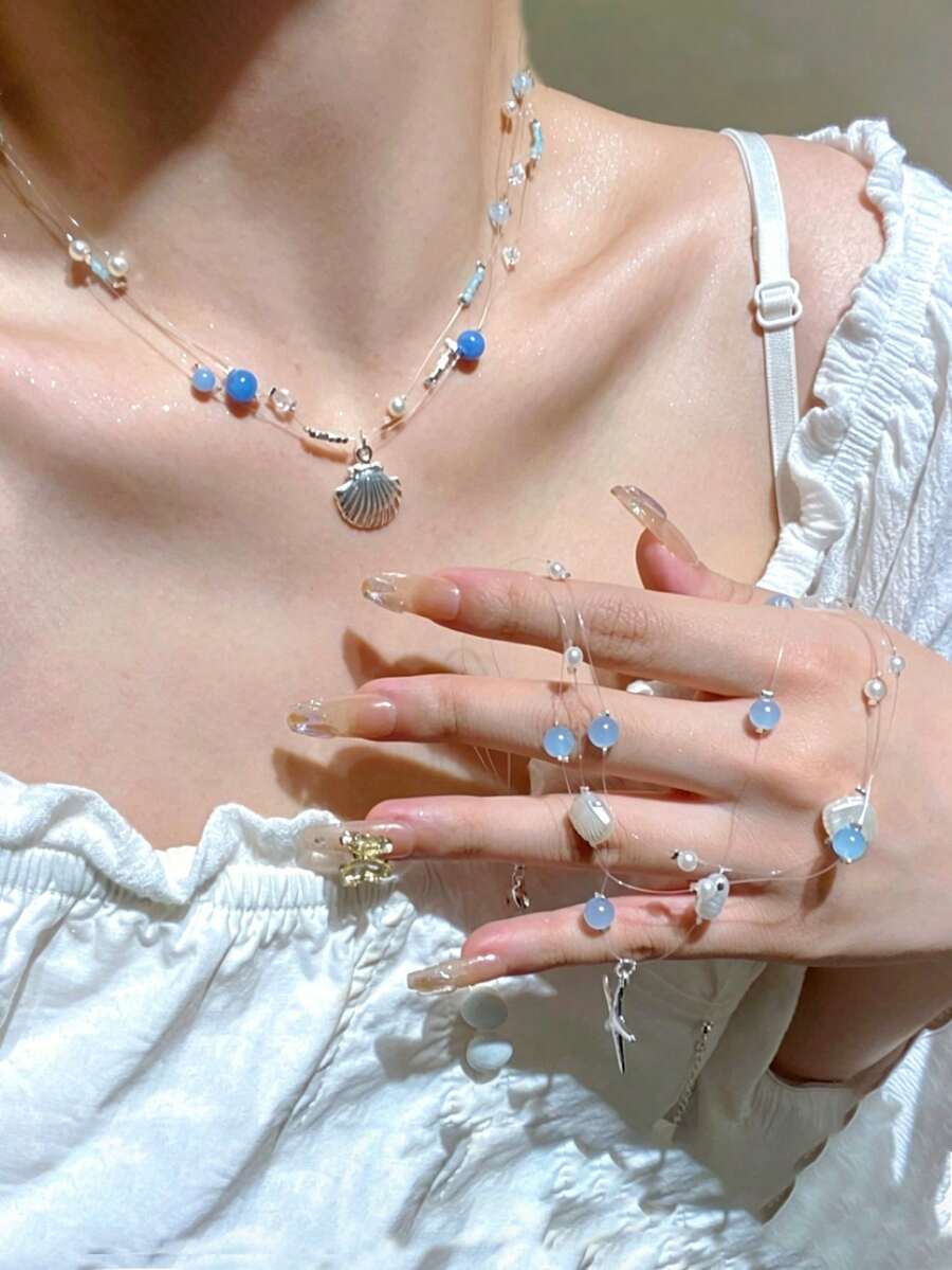 1 chiếc vòng cổ nữ mùa hè kiểu dáng thanh lịch, dây mảnh trong suốt hình cá, hạt đá chalcedony xanh dương và mặt dây chuyền vỏ sò, thiết kế nhiều lớp, quà tặng trang sức cho kỳ nghỉ biển. - Nhiều màu - Xem 1
