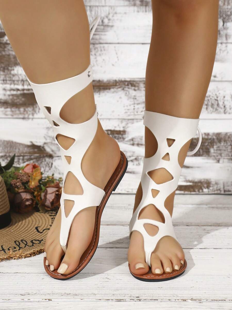 Sandal nữ mùa hè mới cổ cao hở ngón, thiết kế buộc dây, đục lỗ, đính đinh tán, thoải mái thời trang, phong cách La Mã, sandal chiến binh