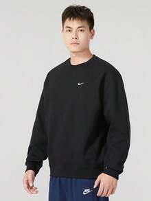 Sudadera Nike Solo Swoosh cómoda y suave de color liso con forro polar para hombre. - Negro - Ver 1