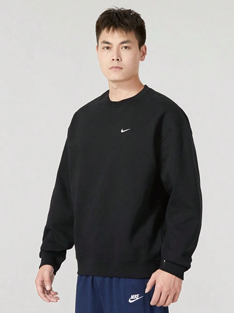Sudadera Nike Solo Swoosh cómoda y suave de color liso con forro polar para hombre. - Negro - Ver 1
