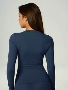 Bộ đồ tập thể dục mùa xuân hè gồm áo tập tay dài cổ tròn và quần legging nâng mông. - Màu xanh lam - Xem 6
