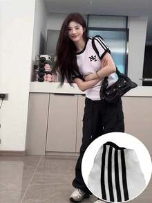 Áo thun nữ thể thao tay raglan phối màu tương phản, dáng ôm in chữ, tay ngắn, màu trắng, kiểu dáng thường ngày. - trắng - Xem 2