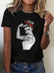 Vintage Woodward Rivet Working Women's T-Shirt "We Can Do It!" - Featuring Iconic Poster Art Styling, Combined With A Red Scarf And Polka Dot Bow, This Short-Sleeved, Stretchy Crew Neck Top Is Made Of 95% Cotton/5% Spandex And Is A Casual Vintage Workwear Style Tee. - 黑色 - 查看 1