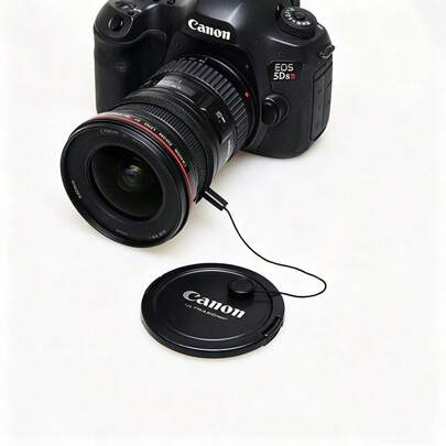 Dây đeo chống thất lạc nắp ống kính, dùng được cho cả máy ảnh DSLR và máy ảnh không gương lật, thiết kế nhỏ gọn và chống thất lạc, phụ kiện dây đeo bảo vệ nắp ống kính máy ảnh.