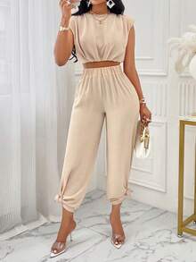 Bộ đồ 2 mảnh thanh lịch màu be của Eileen gồm áo crop top xếp ly không tay và quần ống loe cạp cao, phù hợp cho các bữa tiệc, lễ tốt nghiệp, trang phục thường ngày và những bộ đồ mùa hè sang trọng. - mai nhẹ - Xem 1