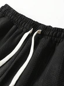 Pantalones cortos casuales para hombre, cintura elástica con cordón, patrón de letras BBR en relieve, tela con relieve, adecuados para estilo de calle de verano y deportes - Negro - Ver 4